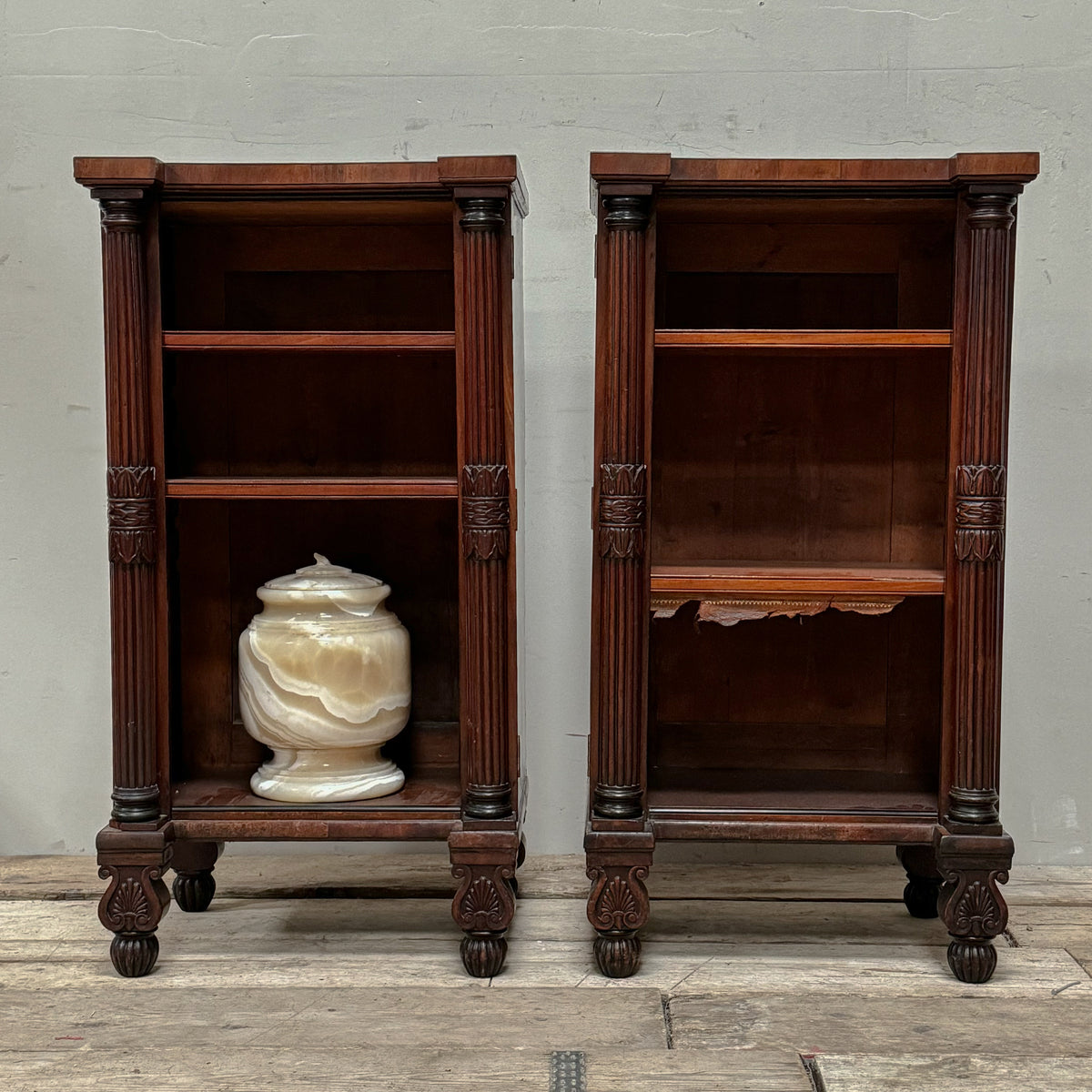 A Pair of Regency Mahogany Open Bookcases in the manner of George Bullock