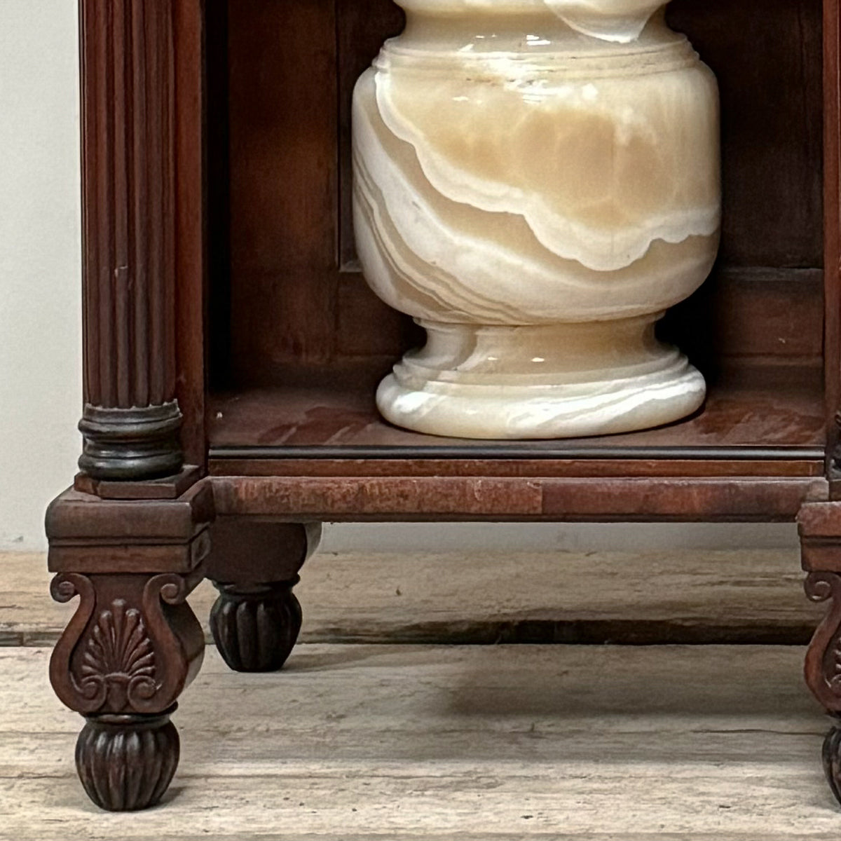 A Pair of Regency Mahogany Open Bookcases in the manner of George Bullock