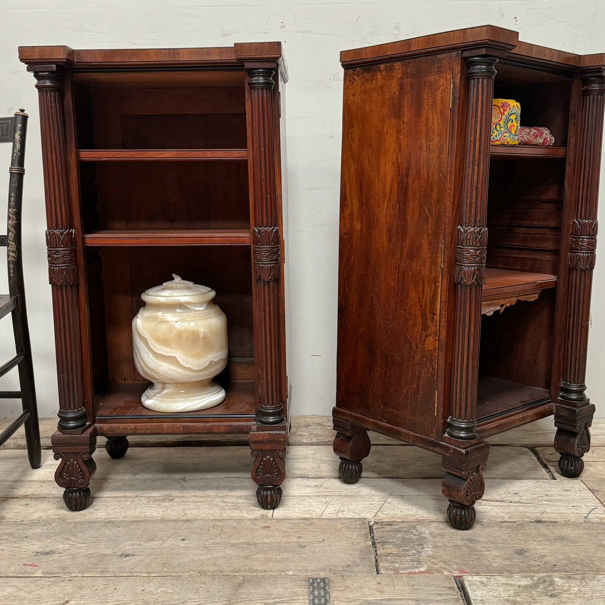 A Pair of Regency Mahogany Open Bookcases in the manner of George Bullock