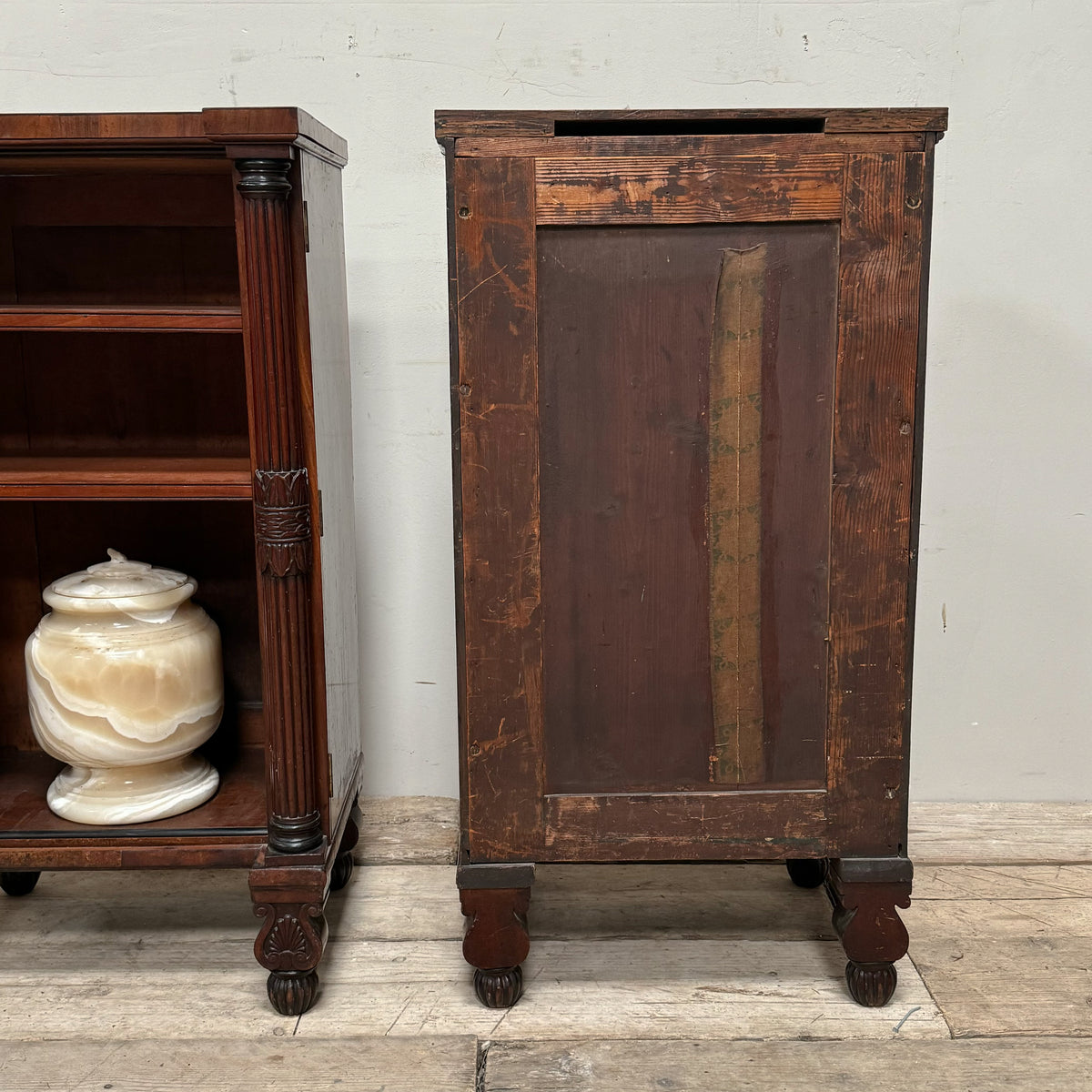 A Pair of Regency Mahogany Open Bookcases in the manner of George Bullock