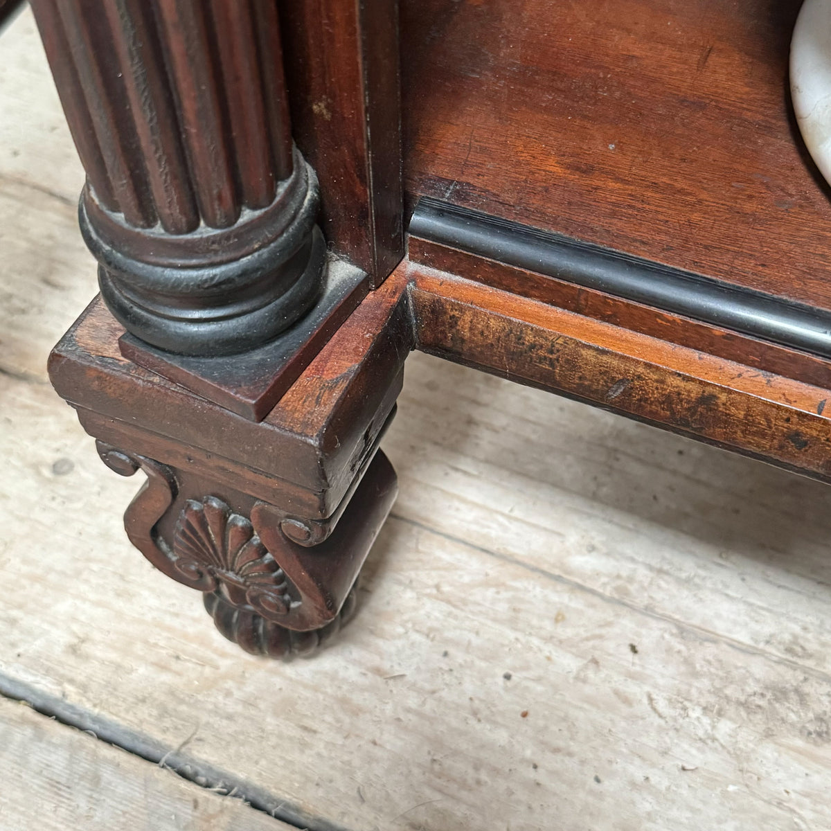 A Pair of Regency Mahogany Open Bookcases in the manner of George Bullock