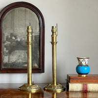 A Pair of Arts & Crafts Movement Brass Lamps