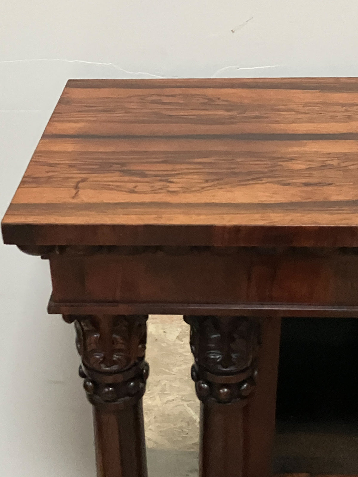 A Late Regency Rosewood Open Bookcase in the Manner of Bullock