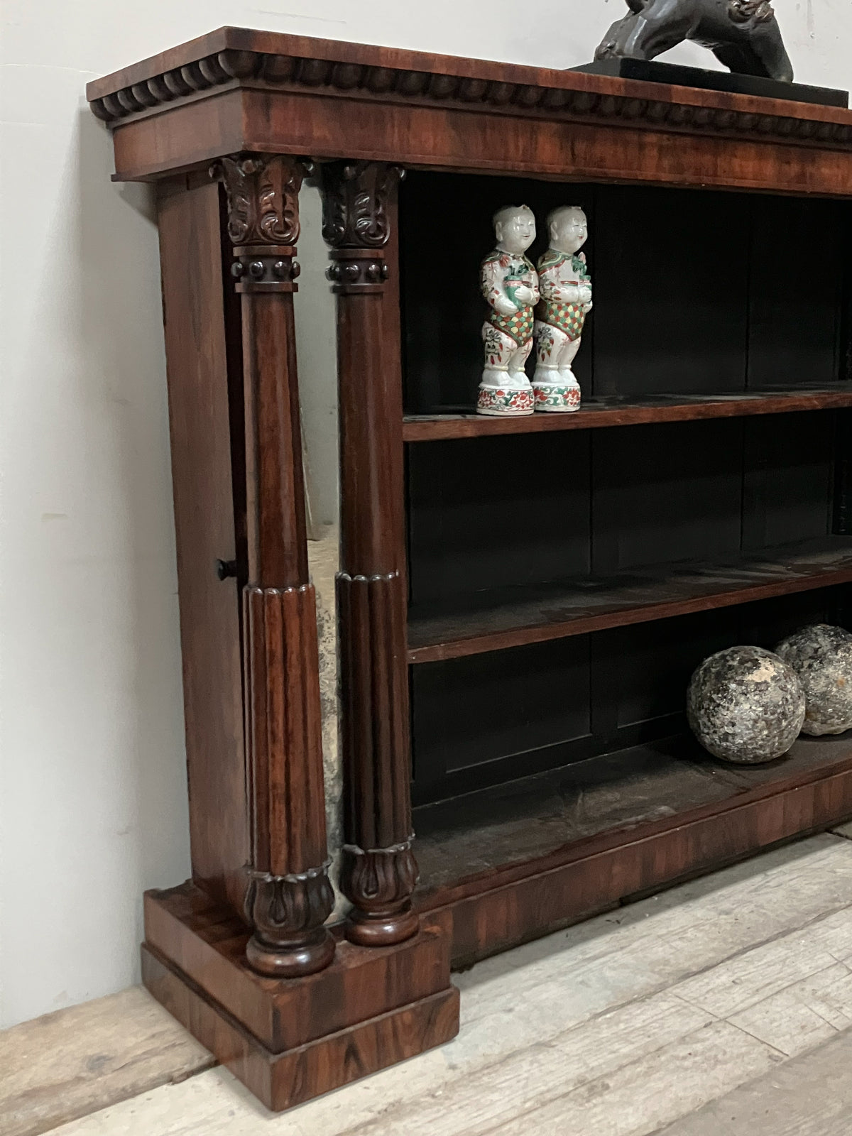 A Late Regency Rosewood Open Bookcase in the Manner of Bullock