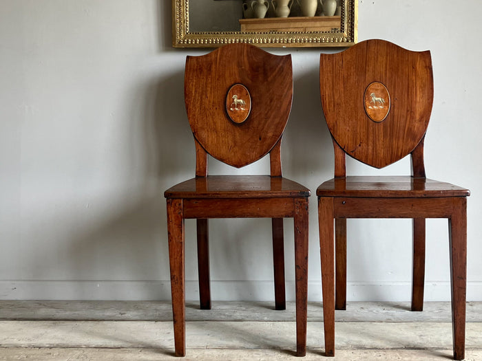 A Pair of George IV Mahogany Hall Chairs