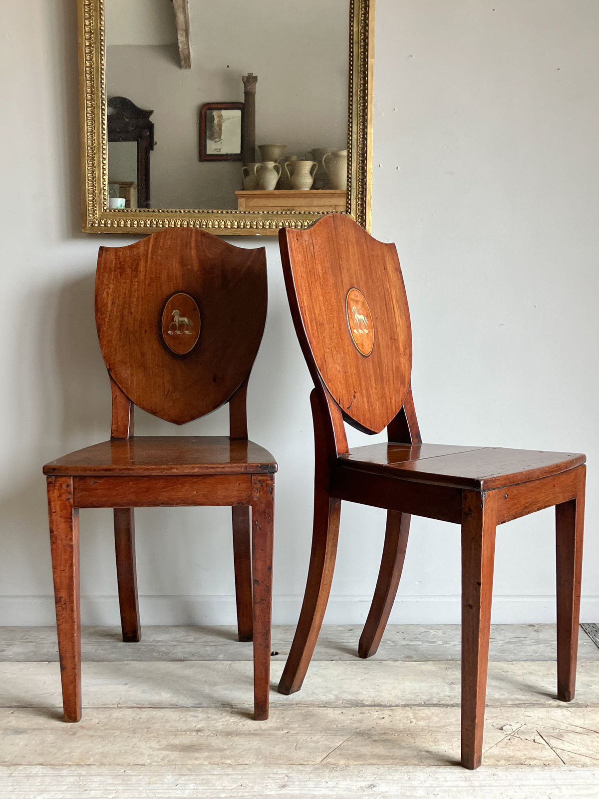 A Pair of George IV Mahogany Hall Chairs