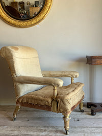 A Mid 19th Century Giltwood Open Armchair