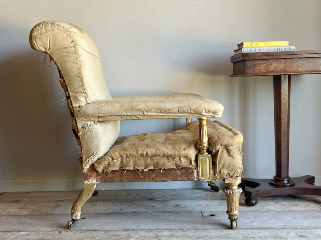 A Mid 19th Century Giltwood Open Armchair