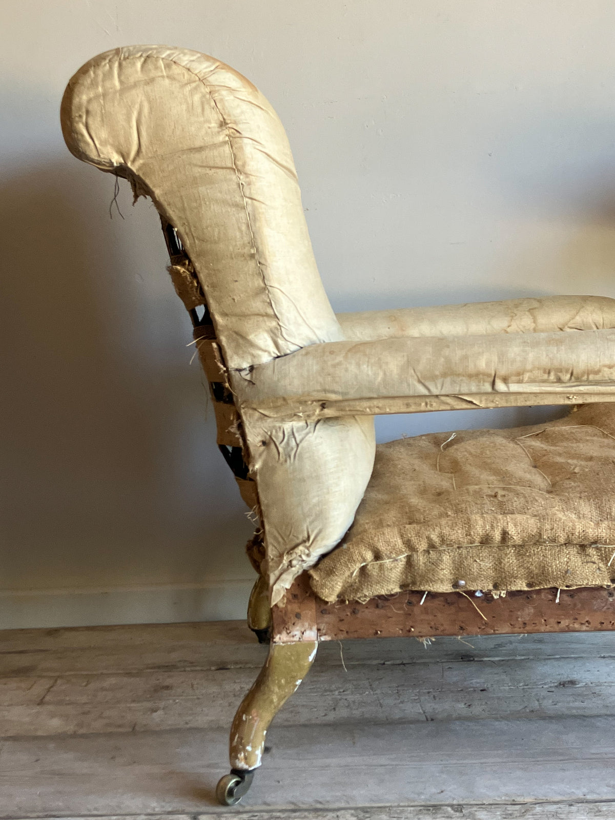 A Mid 19th Century Giltwood Open Armchair