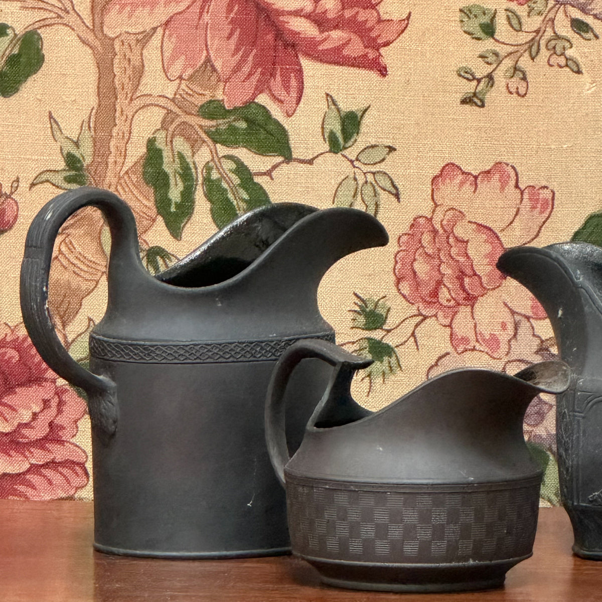 A Collection of Wedgwood Basalt Jasparware Jugs