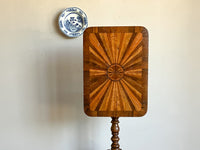 A Late Regency Rosewood and Specimen Wood Table