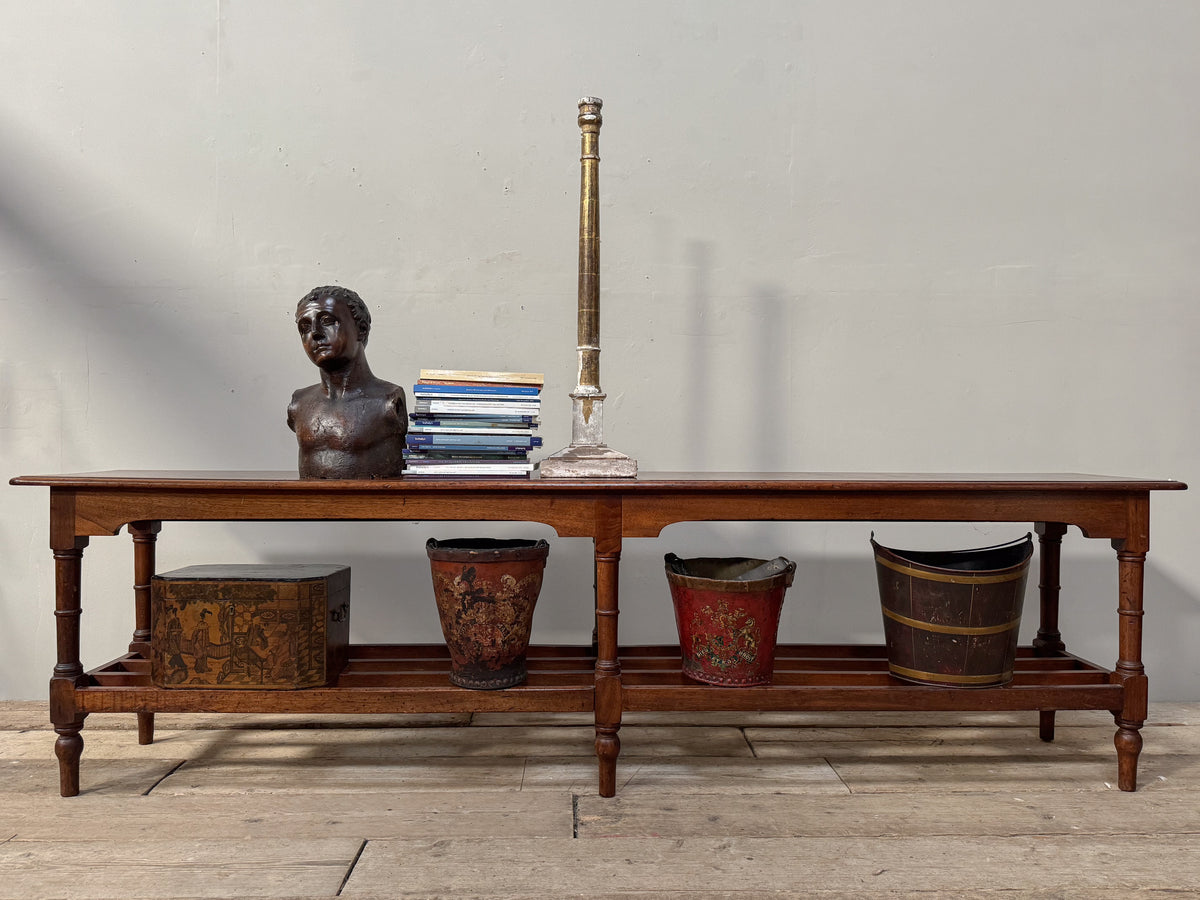 A 19th Century Mahogany Shelved Bench