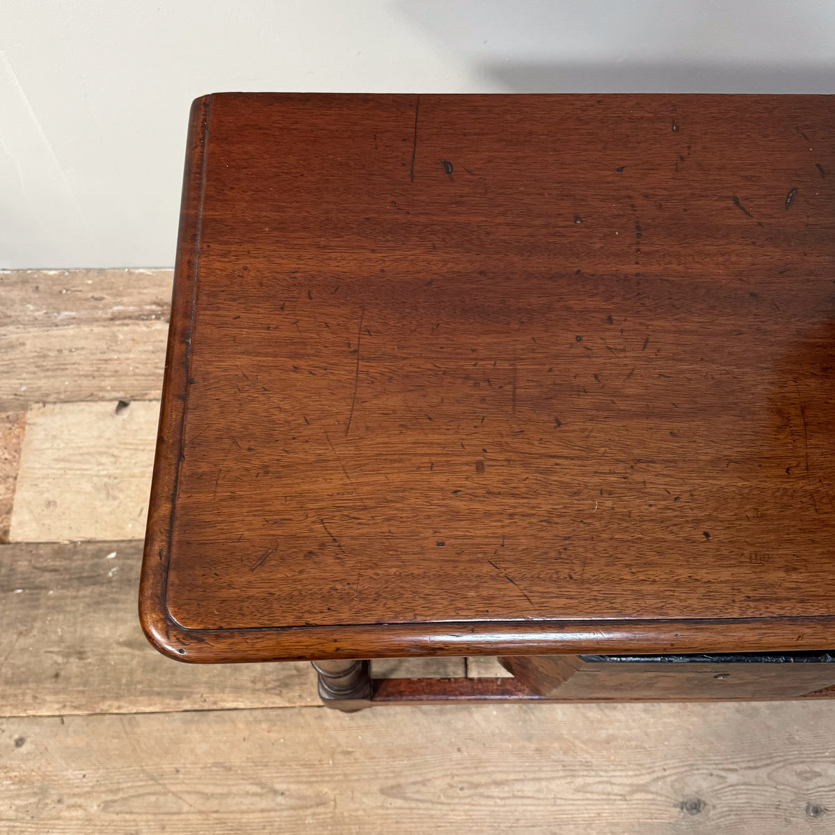 A 19th Century Mahogany Shelved Bench