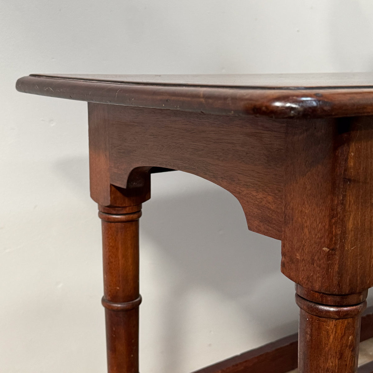 A 19th Century Mahogany Shelved Bench