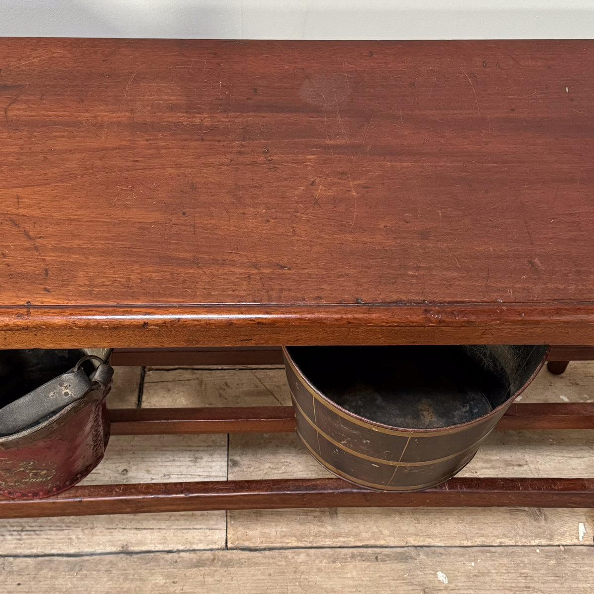 A 19th Century Mahogany Shelved Bench