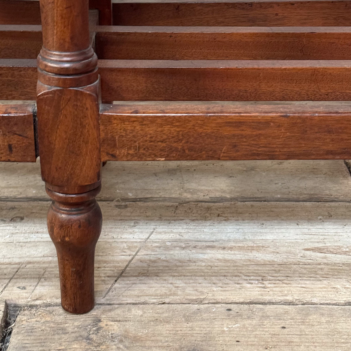 A 19th Century Mahogany Shelved Bench