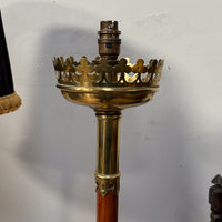 A Pair of Early 20th Century Brass and Oak Standard Lamps