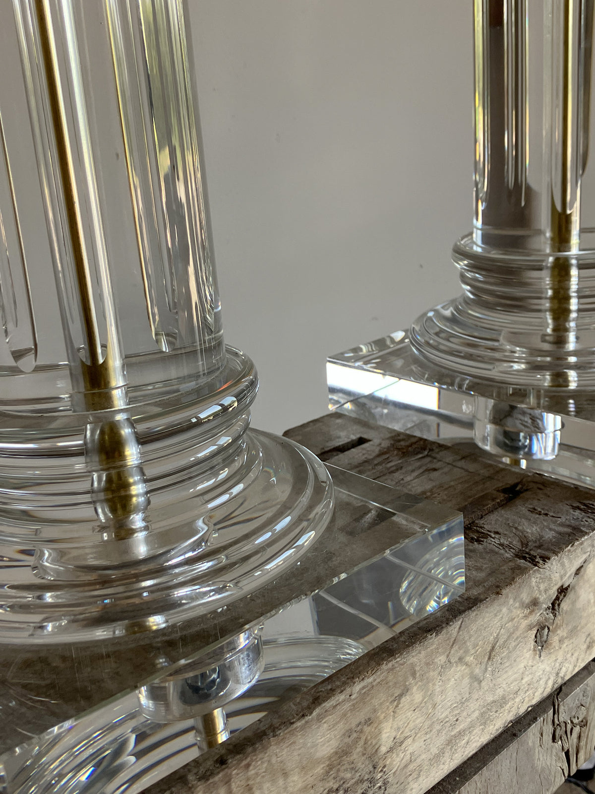 A Pair of Large Glass Column Lamps