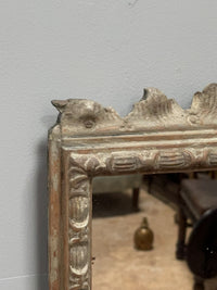 A George II and later Carved Pine Mirror