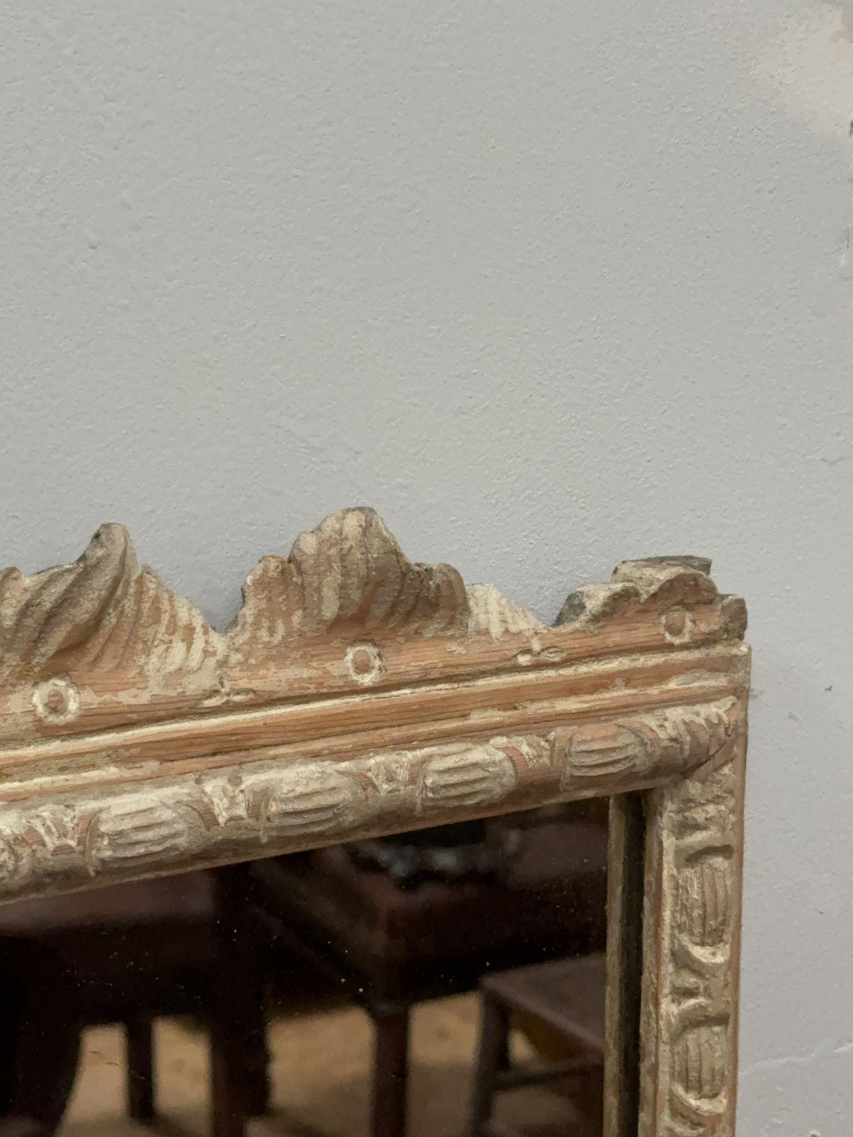 A George II and later Carved Pine Mirror