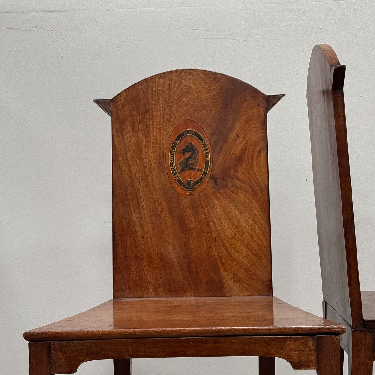 A Set of Six Late Regency Mahogany Hall Chairs