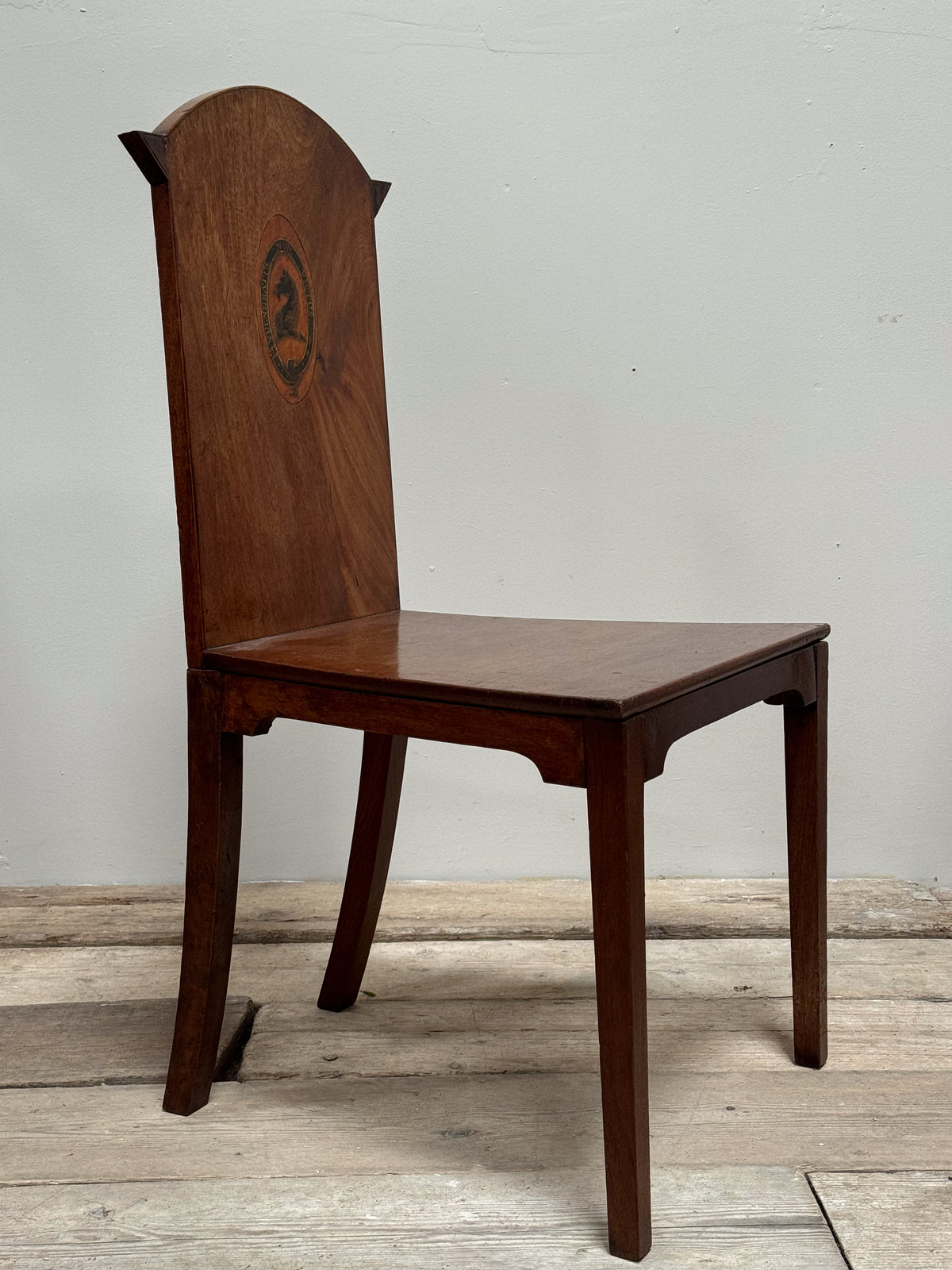 A Set of Six Late Regency Mahogany Hall Chairs