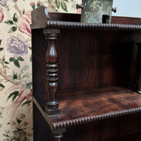 A Late Regency Rosewood Waterfall Bookcase