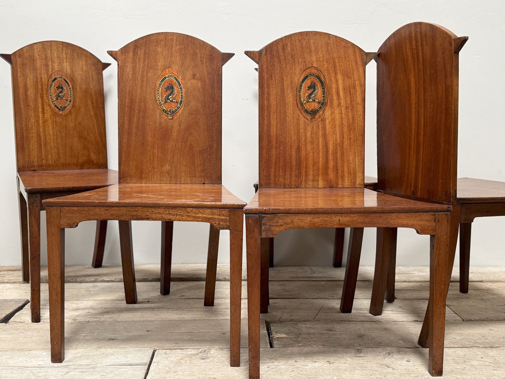 A Set of Six Late Regency Mahogany Hall Chairs