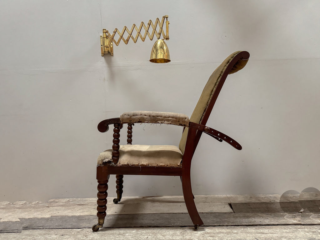 An Aesthetic Movement Reclining Armchair by Philip Webb for Morris &amp; Co.
