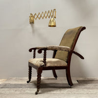 An Aesthetic Movement Reclining Armchair by Philip Webb for Morris &amp; Co.