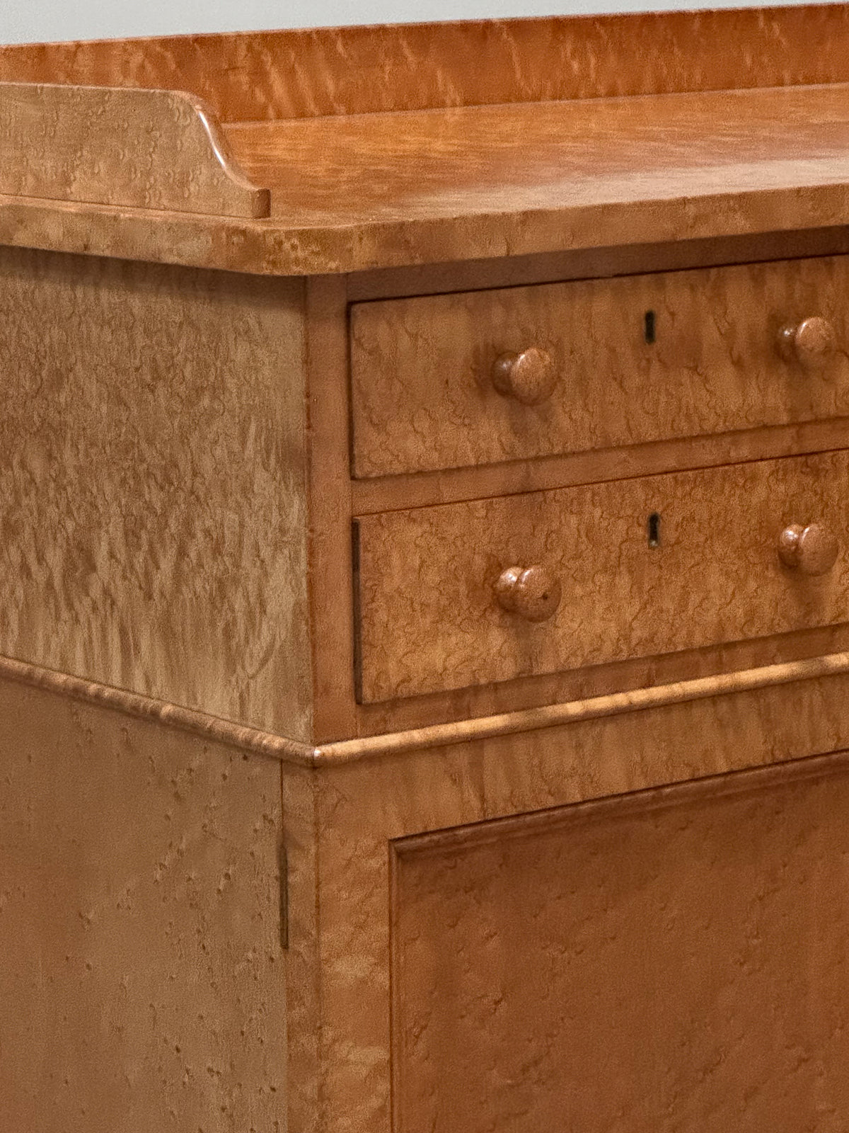 A 19th Century Birds Eye Maple Desk