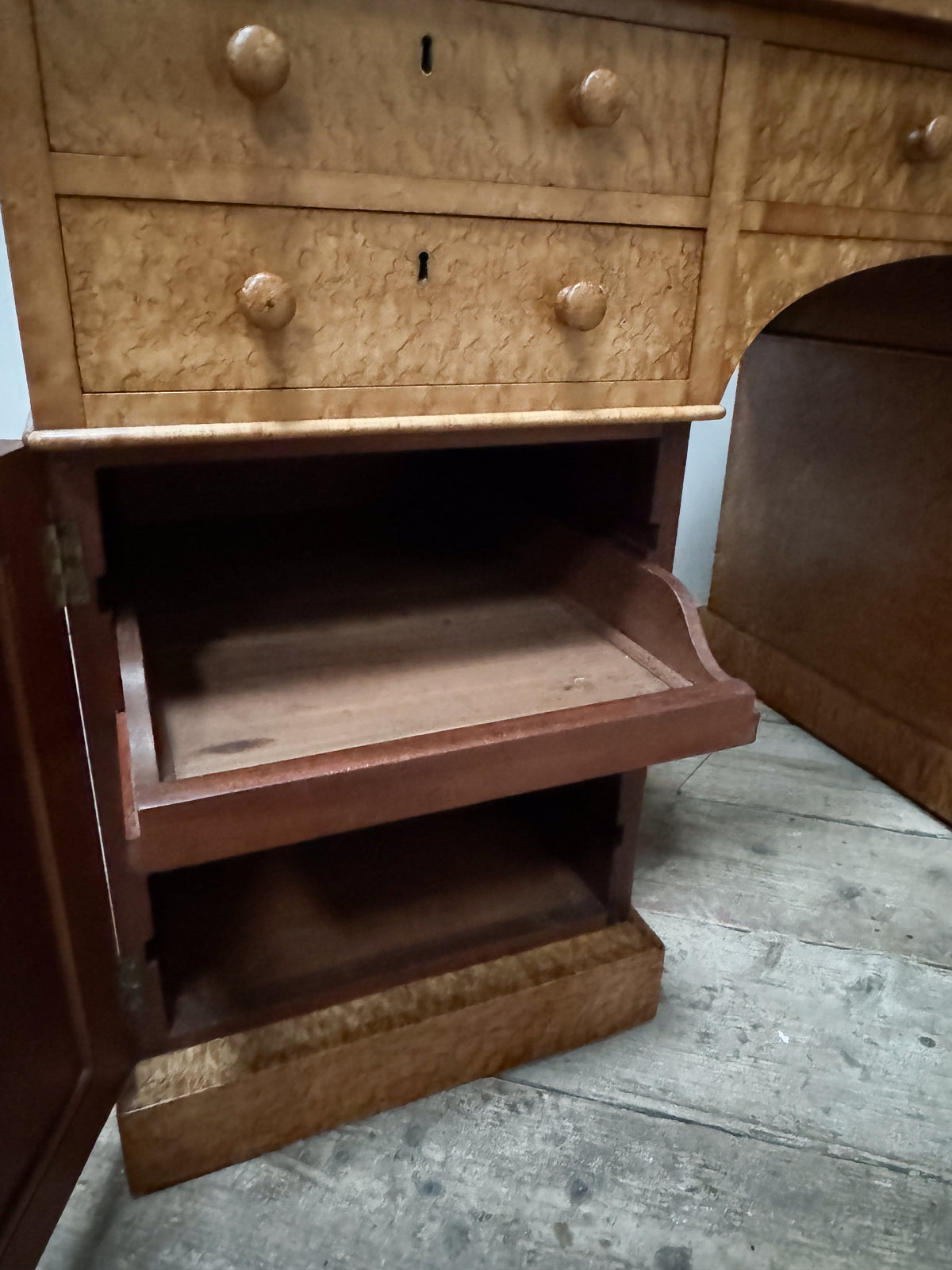 A 19th Century Birds Eye Maple Desk