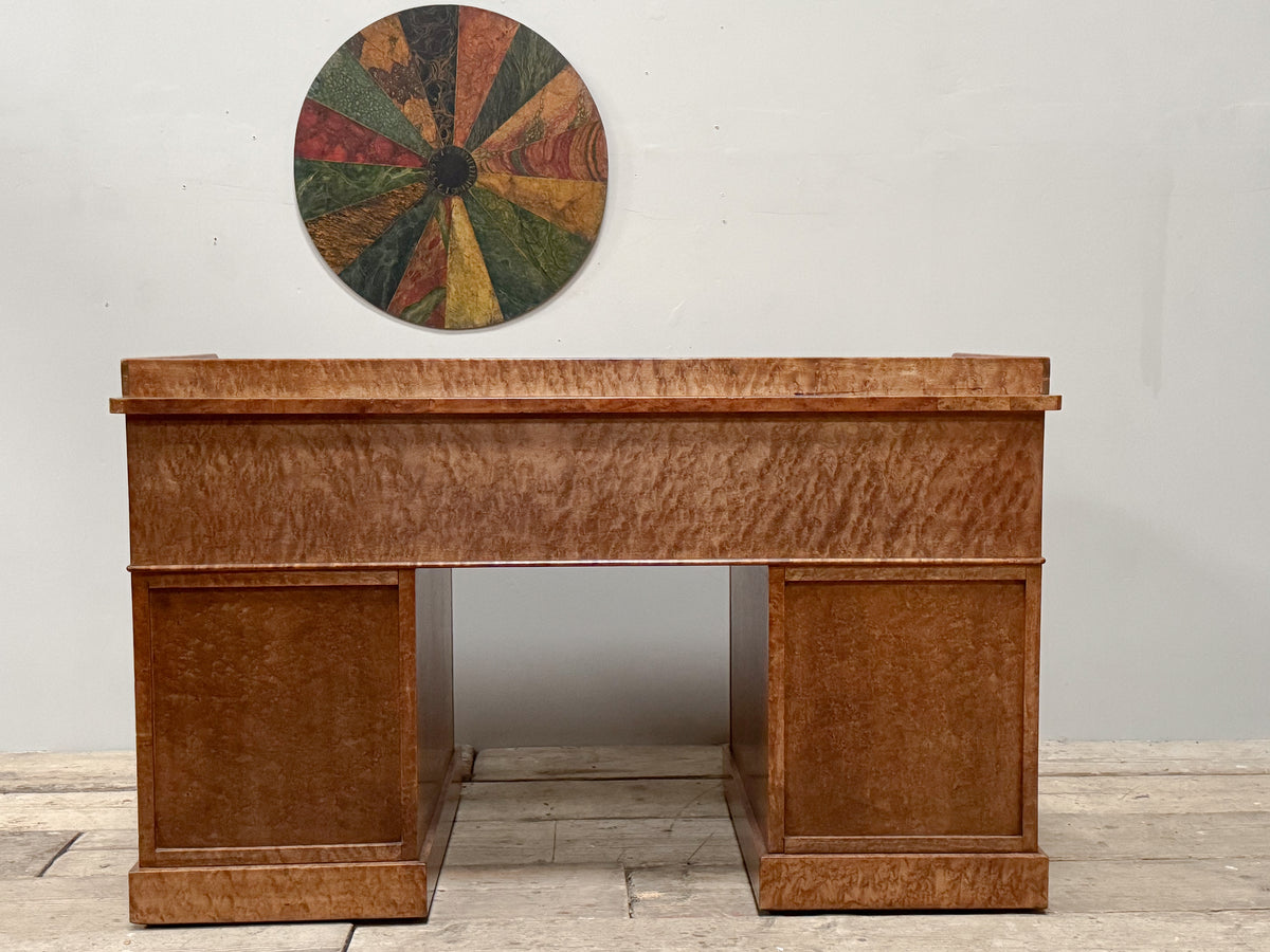 A 19th Century Birds Eye Maple Desk