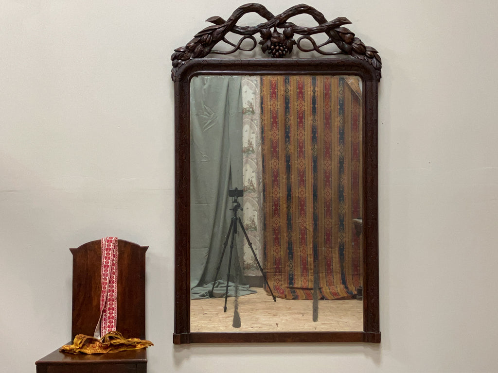 A Large Late 19th Century Black Forest Mirror