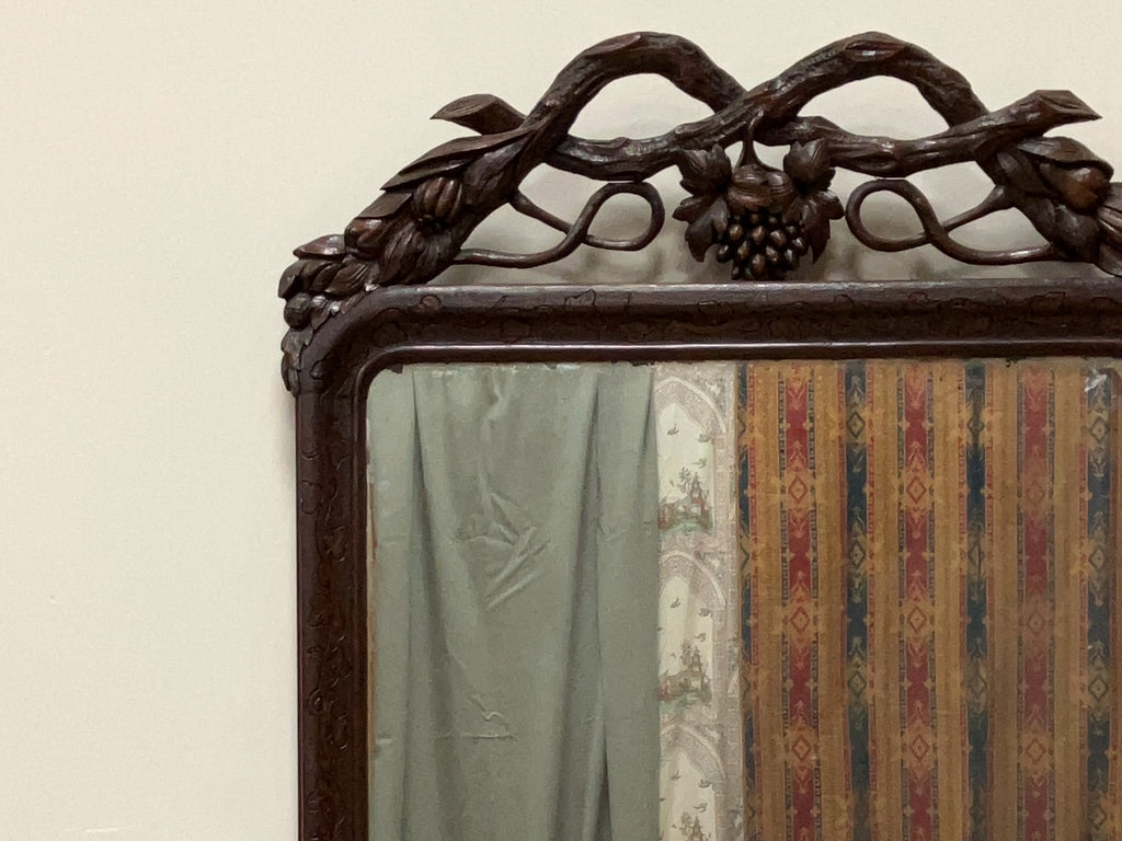 A Large Late 19th Century Black Forest Mirror