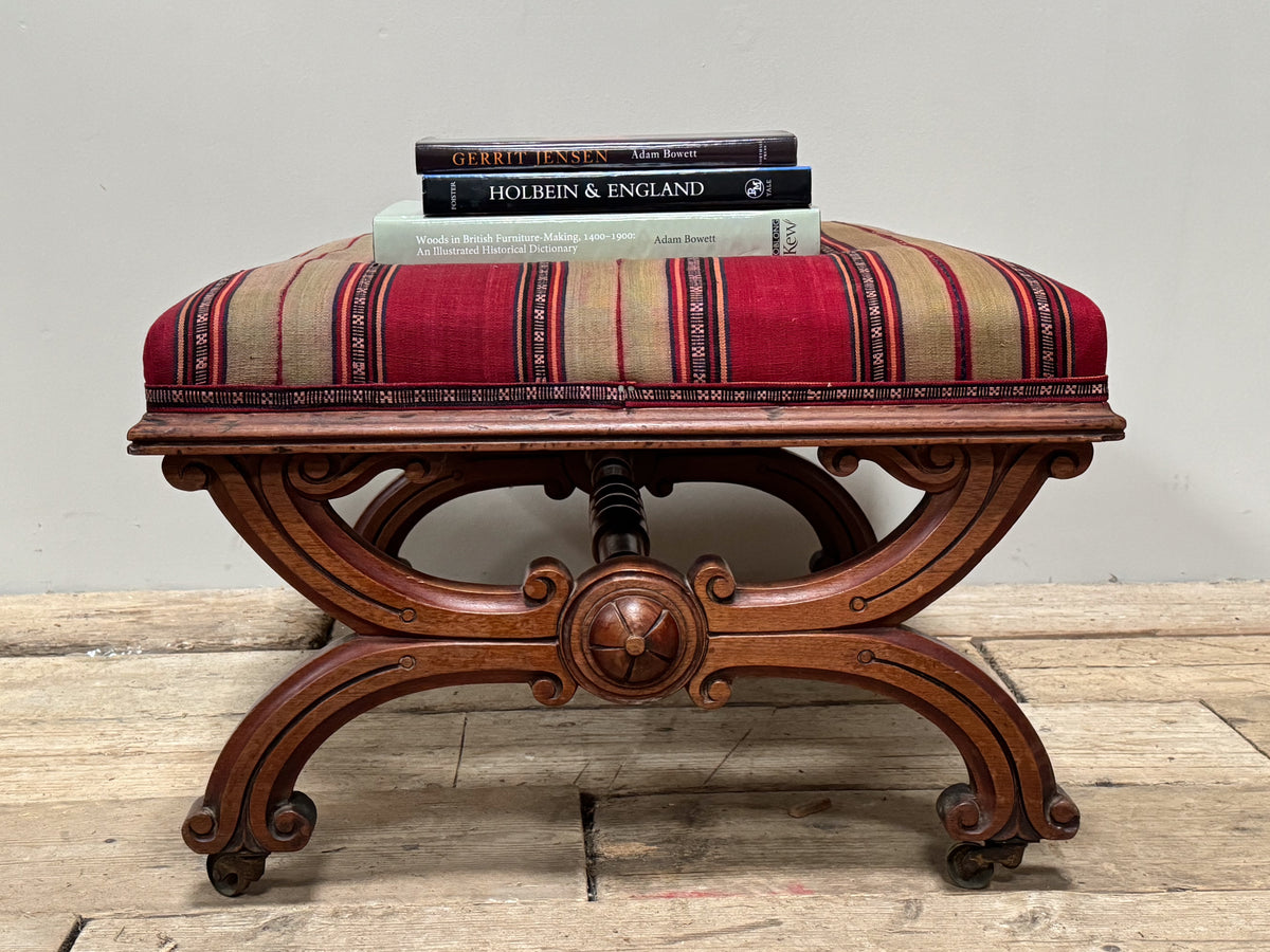 A Regency Upholstered Centre Stool