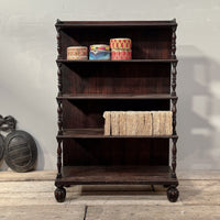 A Late Regency Rosewood Waterfall Bookcase