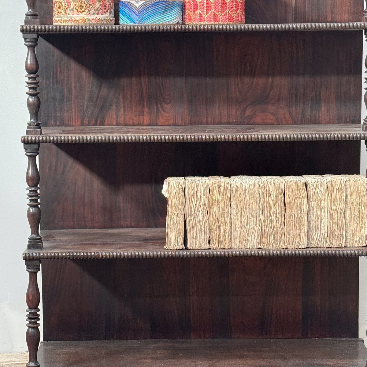 A Late Regency Rosewood Waterfall Bookcase