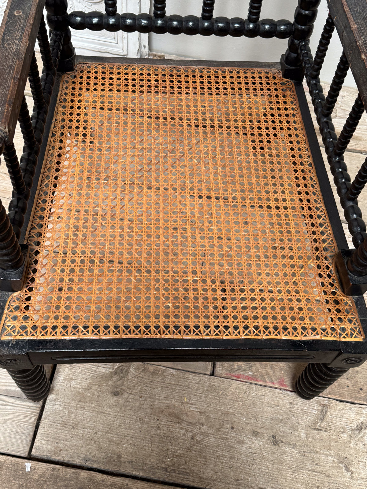 A 19th Century Ebonised Bobbin Chair