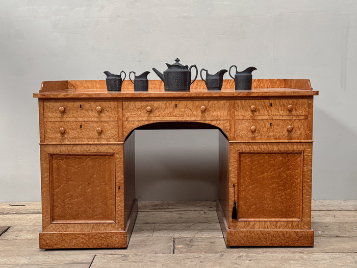 A 19th Century Birds Eye Maple Desk