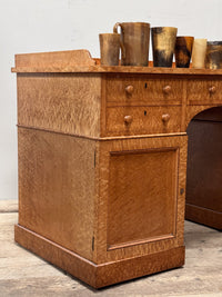 A 19th Century Birds Eye Maple Desk