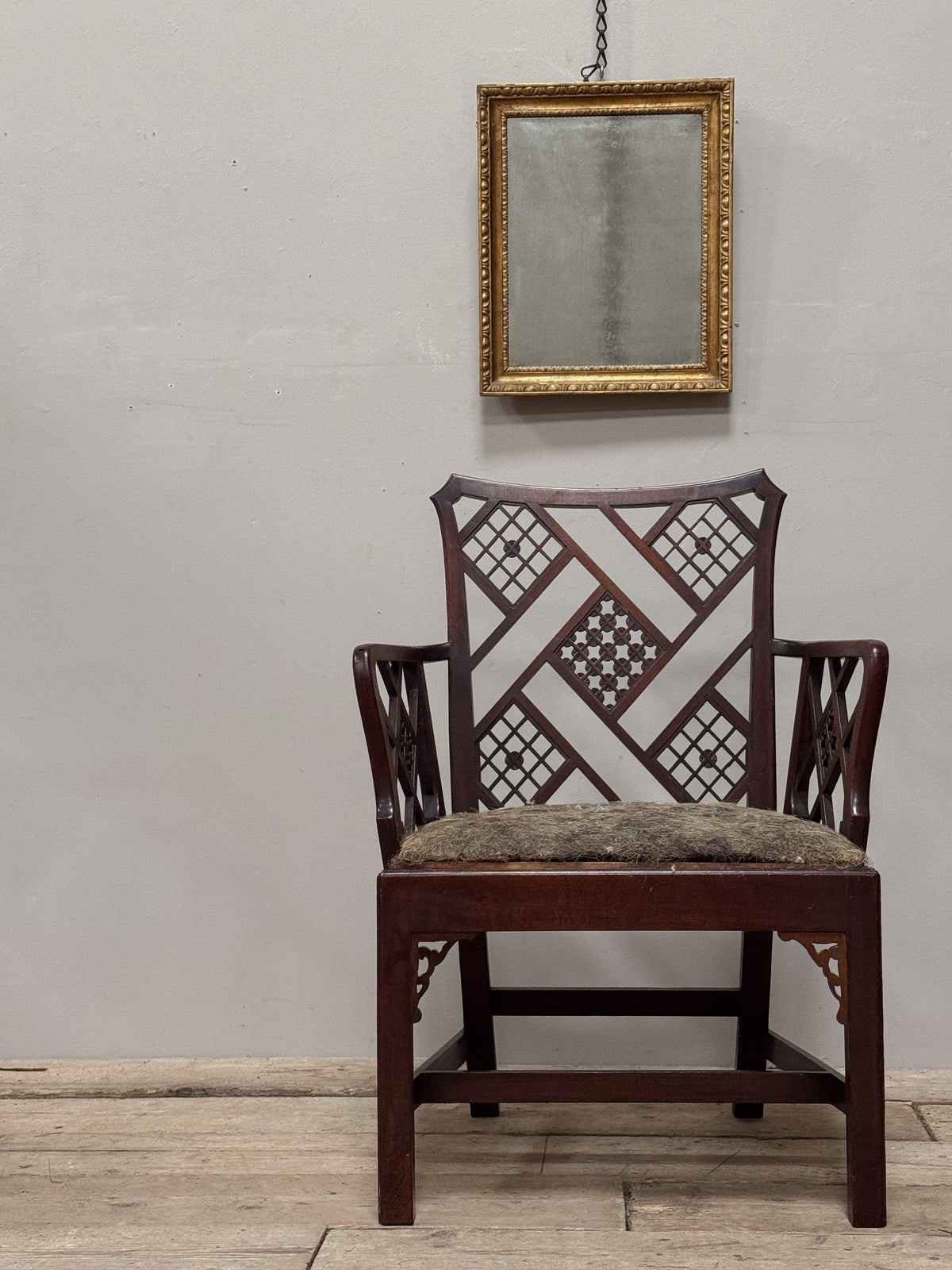 A Rare Set of Four George III Mahogany 'Cockpen' Armchairs