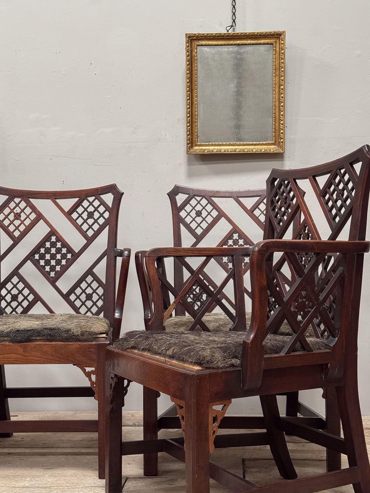 A Rare Set of Four George III Mahogany 'Cockpen' Armchairs