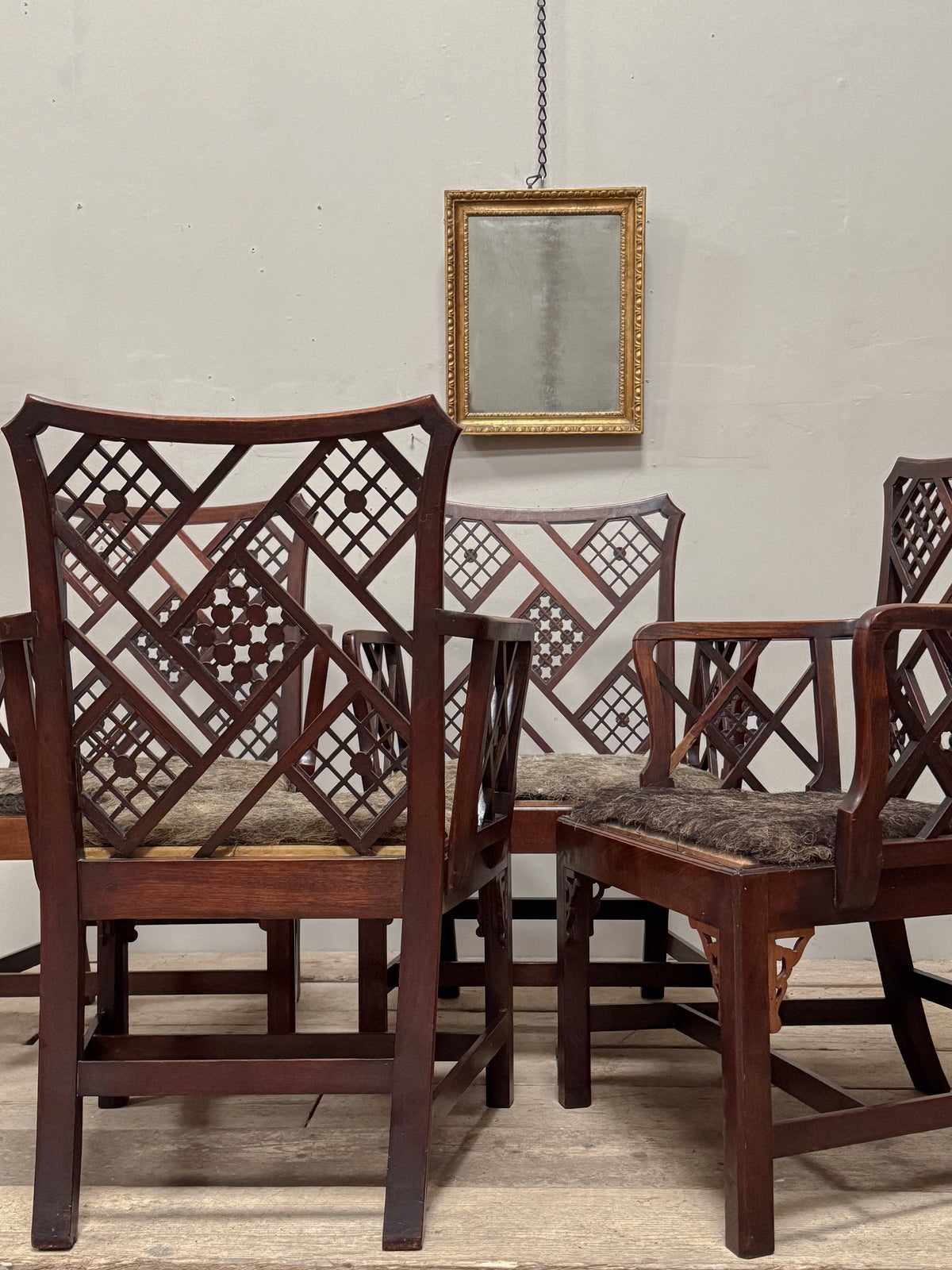 A Rare Set of Four George III Mahogany 'Cockpen' Armchairs