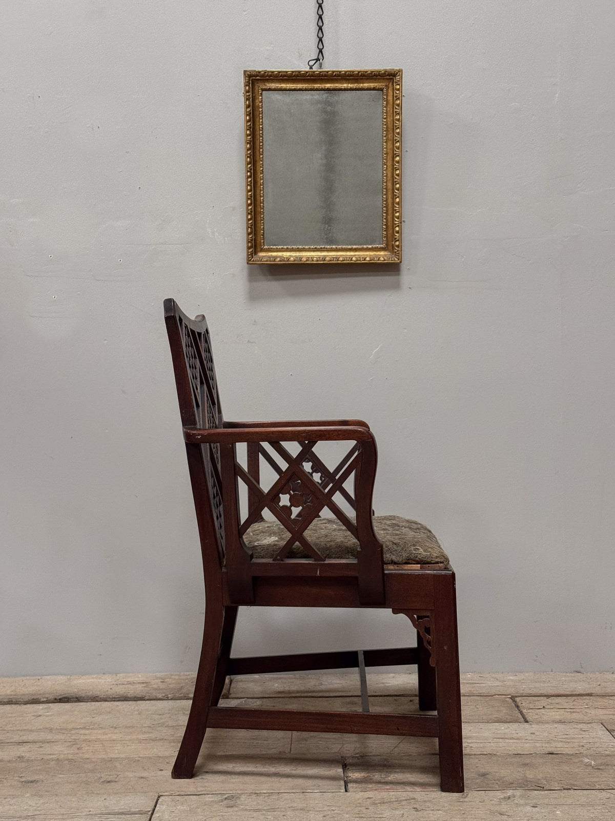 A Rare Set of Four George III Mahogany 'Cockpen' Armchairs