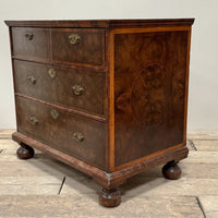 A William & Mary Oyster Veneered Chest of Drawers