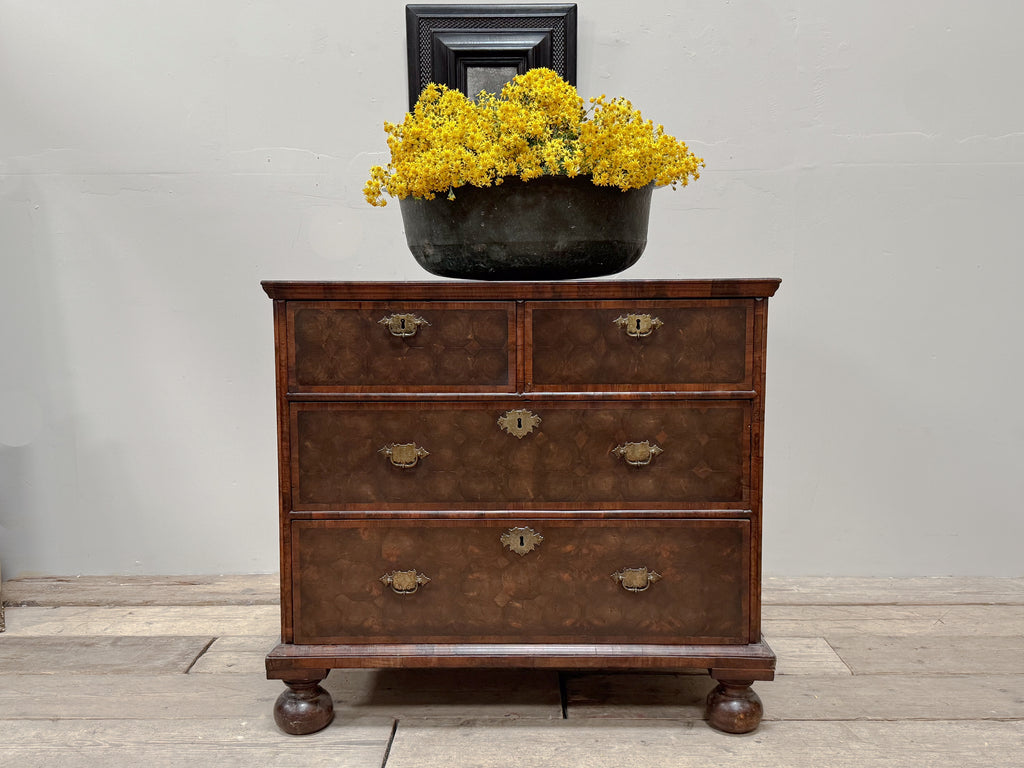 A William & Mary Oyster Veneered Chest of Drawers