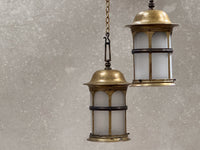 A Pair of Arts & Crafts Brass Lanterns