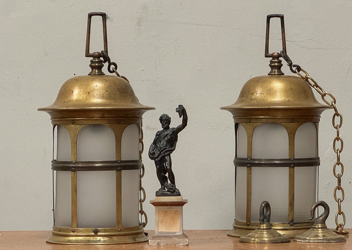 A Pair of Arts & Crafts Brass Lanterns