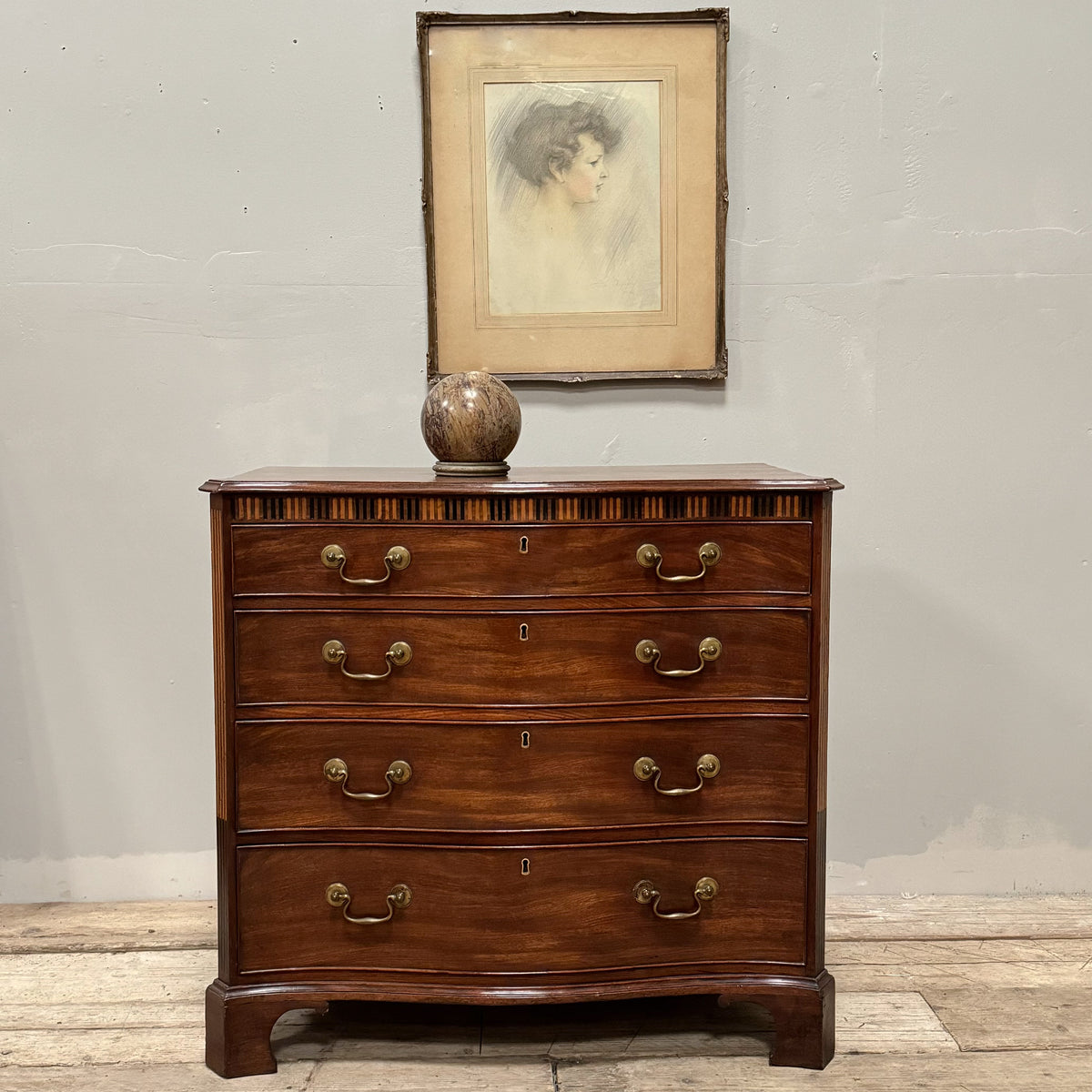 A George III Mahogany Serpentine Chest of Drawers